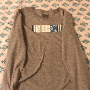 grey long sleeve nike shirt